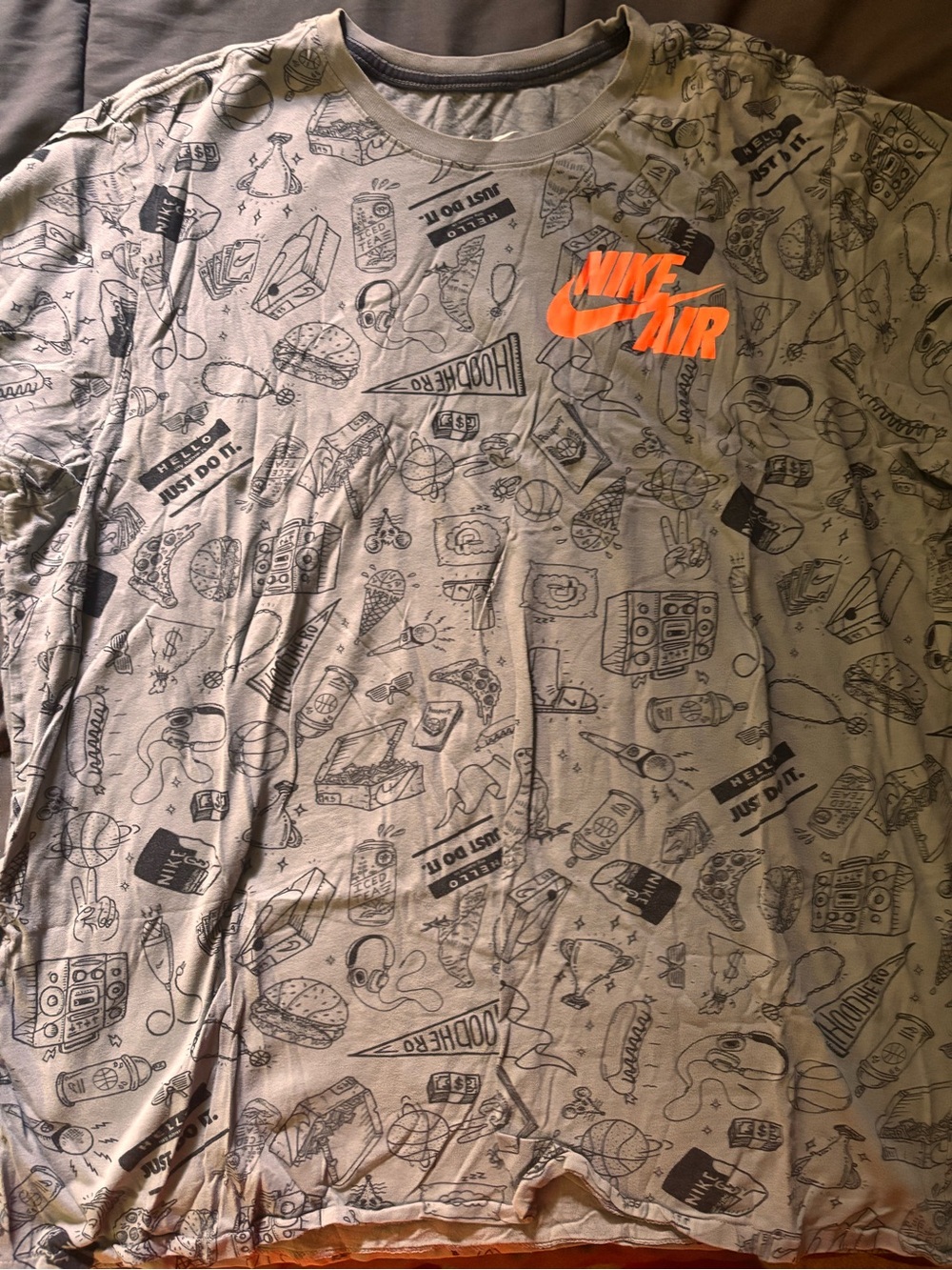 Nike Men’s Light Gray Graphic Tee with Orange Nike Air Logo